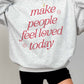 Felpa oversize con stampa “Make People Feel Loved Today”
