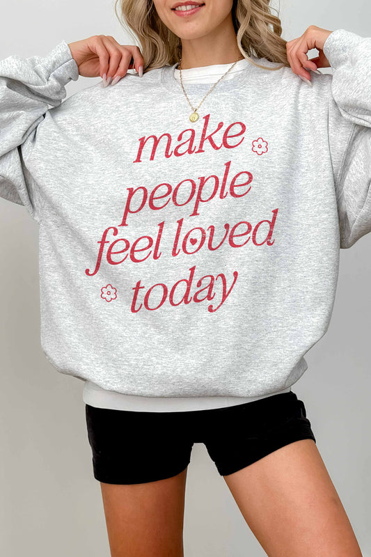 Felpa oversize con stampa “Make People Feel Loved Today”