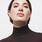 Maglione in maglia rasata con collo alto e maniche 3/4