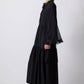 Abito lungo in chiffon nero con volant