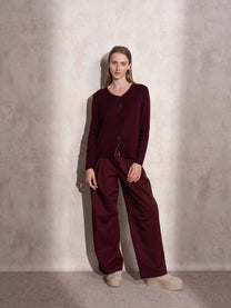 Maglione in maglia scintillante con profilo ondulato