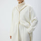 Giacca lunga con cappuccio e zip