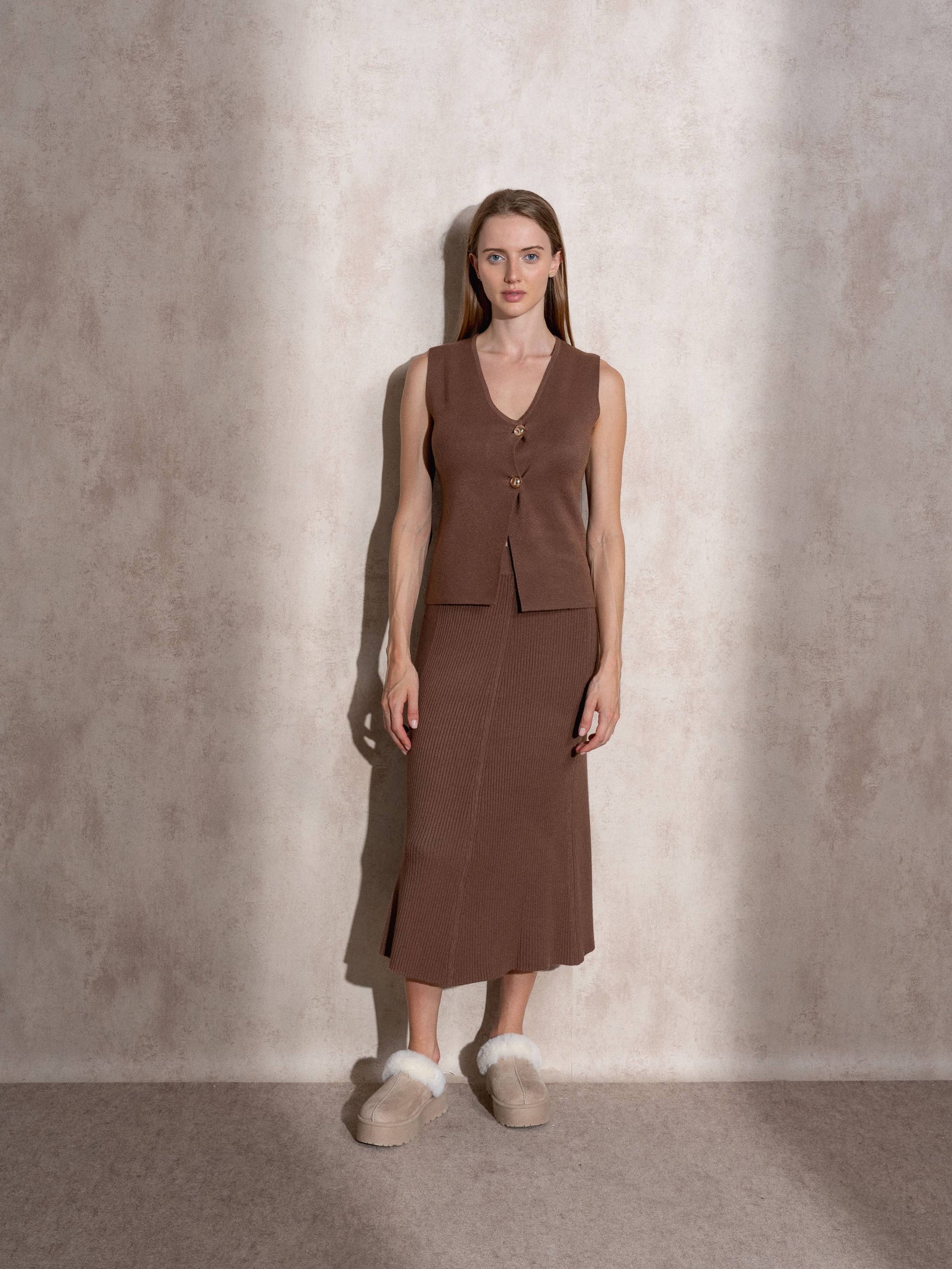 Gilet in maglia con bottoni dorati