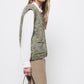 Gilet in maglia con bottoni a contrasto