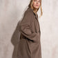 Cappotto midi doppiopetto con revers ampio