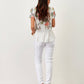 Pantaloni skinny bianchi con banda laterale