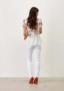 Pantaloni skinny bianchi con banda laterale