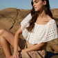 Blusa in sangallo con ricamo e scollo elasticizzato