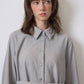 Camicia lunga in viscosa con bottoni argento e cintura