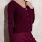 Cardigan in maglia con bottoni dorati