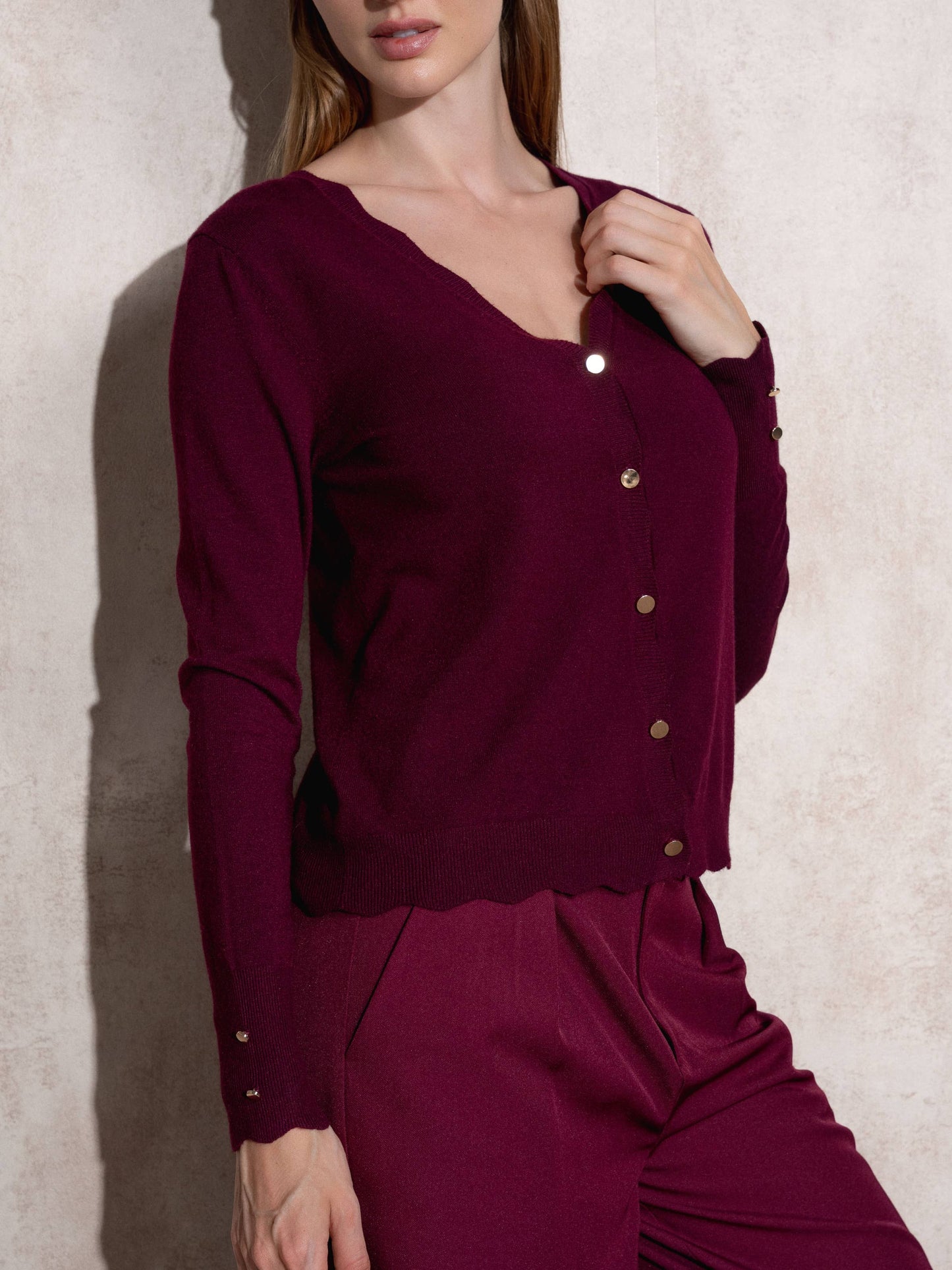 Cardigan in maglia con bottoni dorati