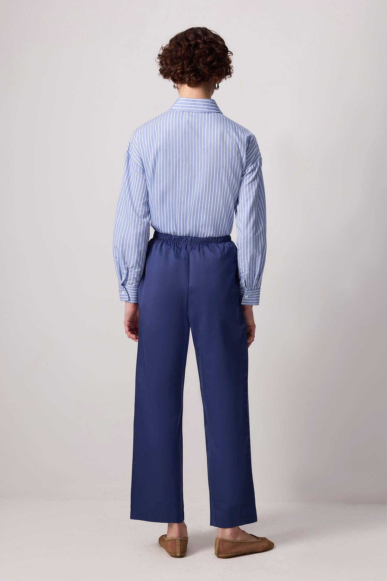 Pantaloni a gamba larga con cintura a fascia in misto cotone