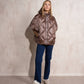 Cappa imbottita oversize con cappuccio e zip