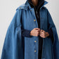 Poncho in denim con cappuccio