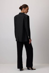Blazer gessato nero con bottoni metallici