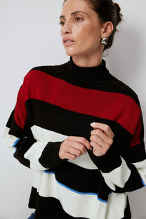 Maglione tunica a righe con collo alto