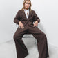 Pantaloni a gamba larga con zip laterale