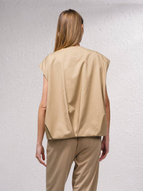 Gilet oversize beige con zip e tasche frontali