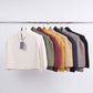 Poncho maglione in maglia a coste con collo alto