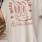 T-shirt oversize con grafica western fatta a mano