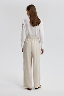 Pantaloni sartoriali in lino crema a gamba larga