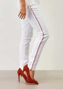 Pantaloni skinny bianchi con banda laterale