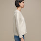Maglione in maglia con scollo a V e micro paillettes