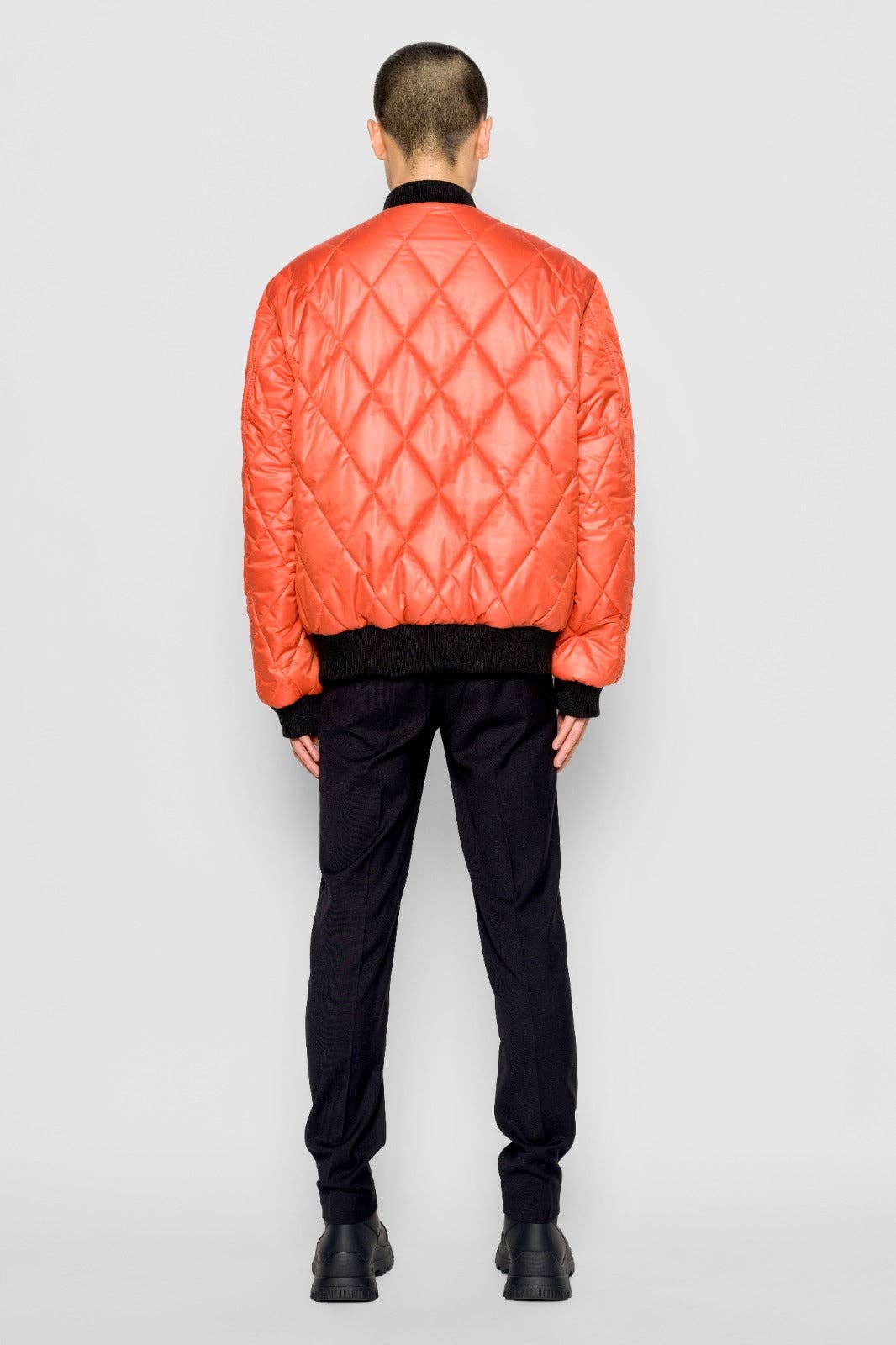 Bomber trapuntato a rombi arancione con zip