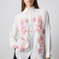 Camicia oversize bianca con ricami floreali