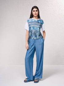 T-shirt oversize corta con stampa e fiocco laterale