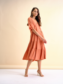 Abito fluido midi con scollo a V