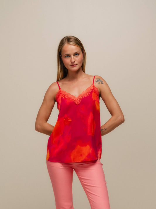 Top stampato con pizzo e scollo a V