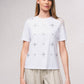 T-shirt bianca con applicazioni brillanti