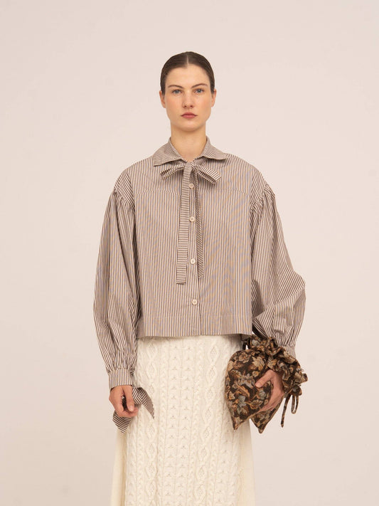 Pochette a sacchetto floreale marrone