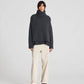 Maglione dolcevita oversize in lana d’agnello grigio scuro mélange