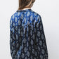 Blusa in raso stampato con bottoni