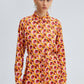 Camicia in raso fantasia geometrica con cintura