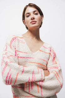 Maglione in maglia a righe con scollo a V
