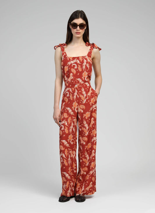 Pantaloni a vita alta terracotta con stampa frecce