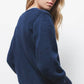 Maglione in maglia rasata con scollo a V