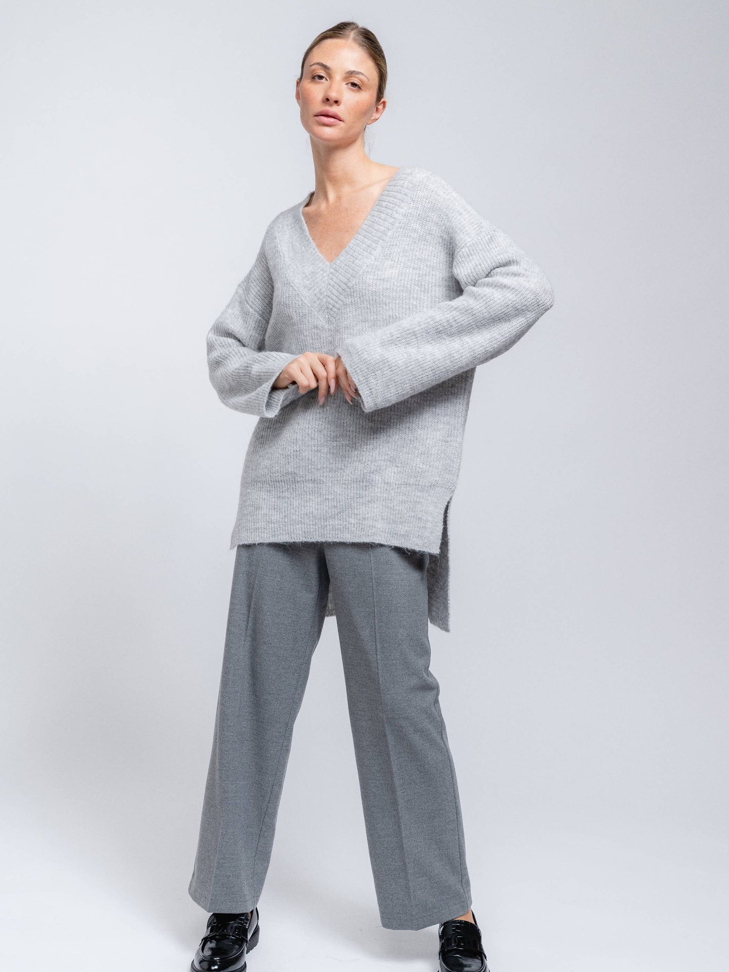 Maglione tunica da donna con scollo a V
