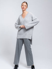 Maglione tunica da donna con scollo a V