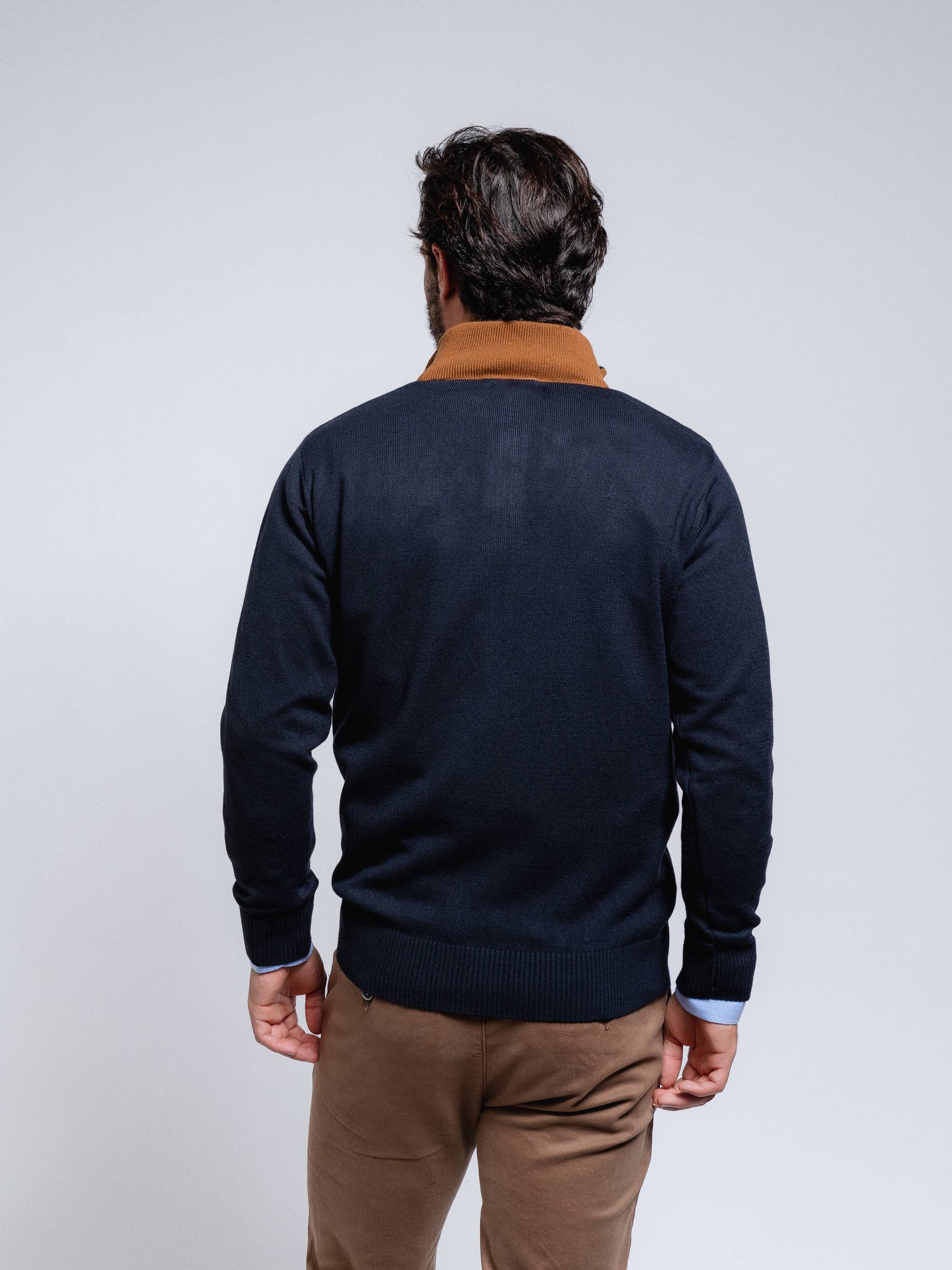 Polo in maglia a righe con mezza zip