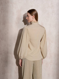 Blusa con maniche a palloncino e collo arricciato