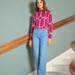 Jeans in denim con bottoni a cuore
