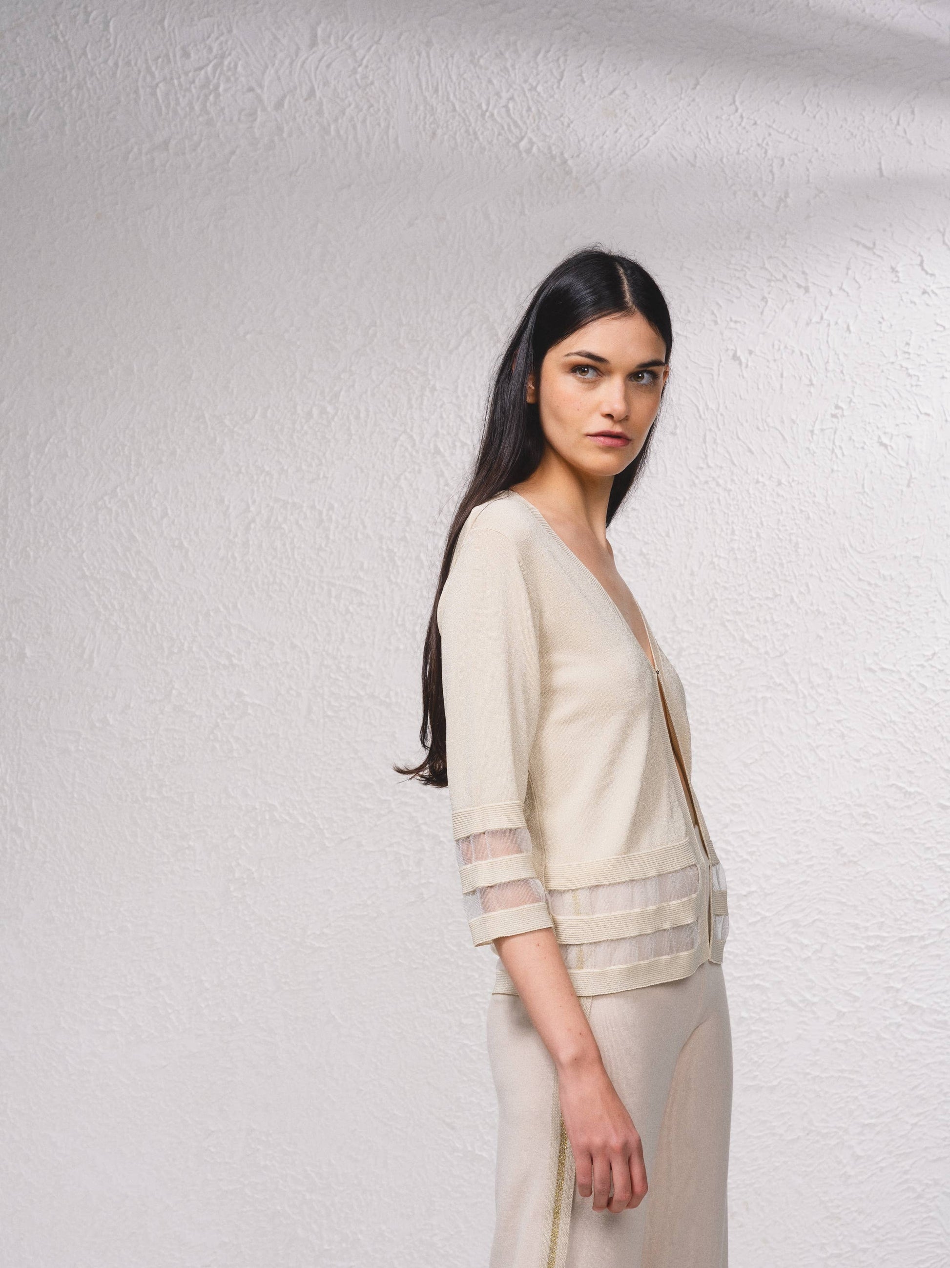 Giacca corta in maglia lurex con trasparenze