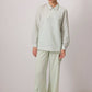 Camicia seersucker a righe con bottoni asimmetrici menta e bianco