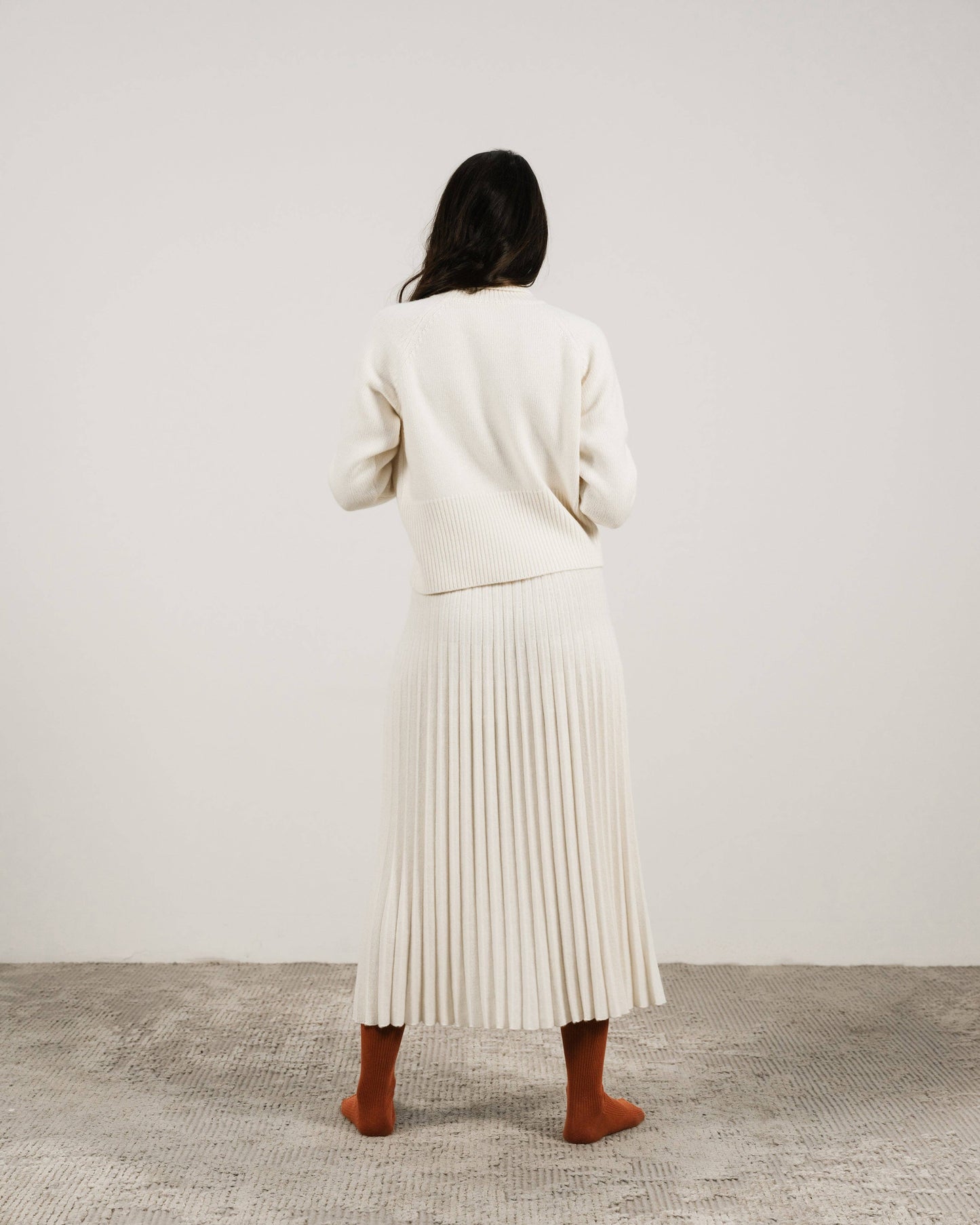 Maglione dolcevita corto in misto cashmere con polsini risvoltati