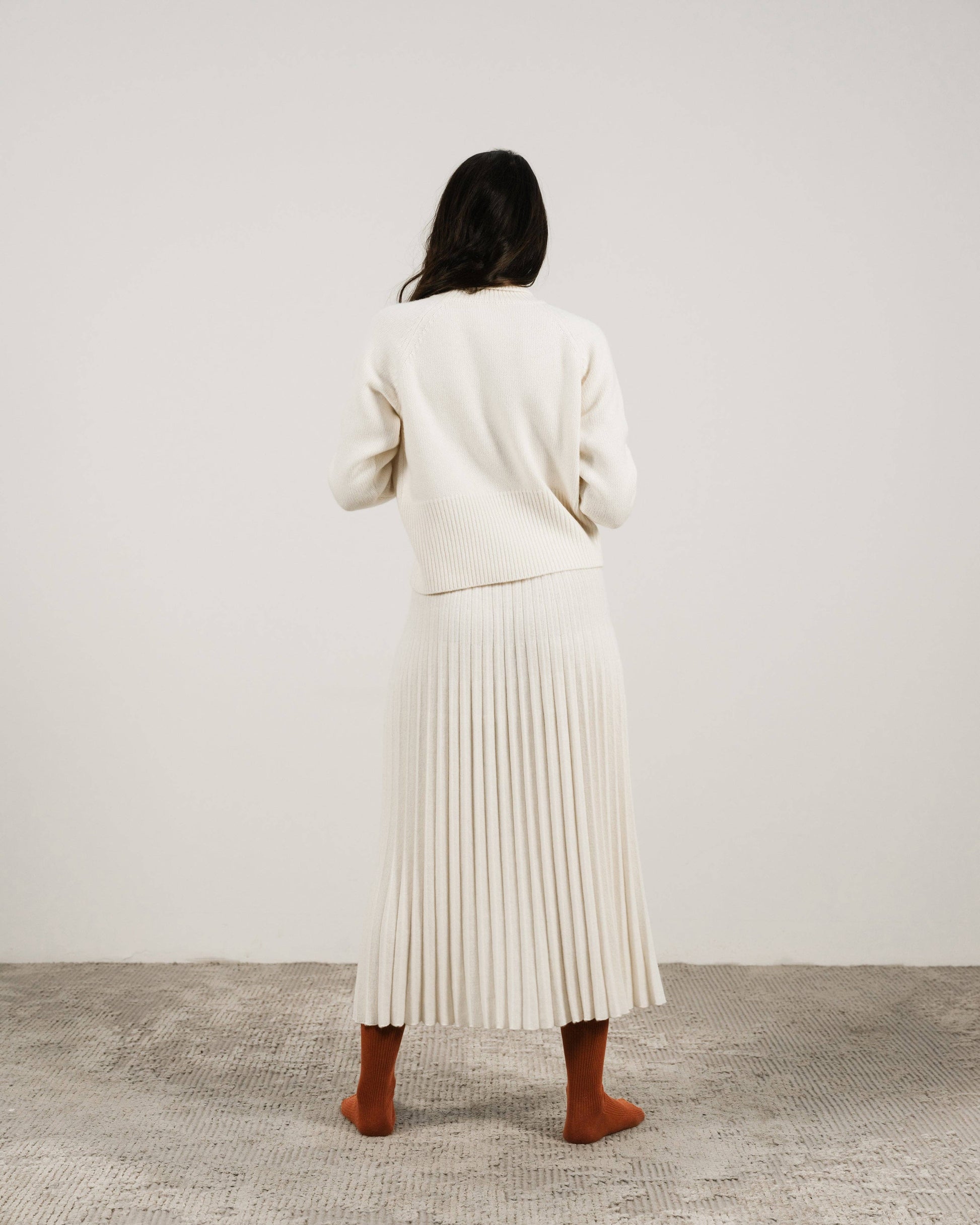 Maglione dolcevita corto in misto cashmere con polsini risvoltati