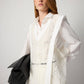Maglia stratificata in pizzo con scollo a V